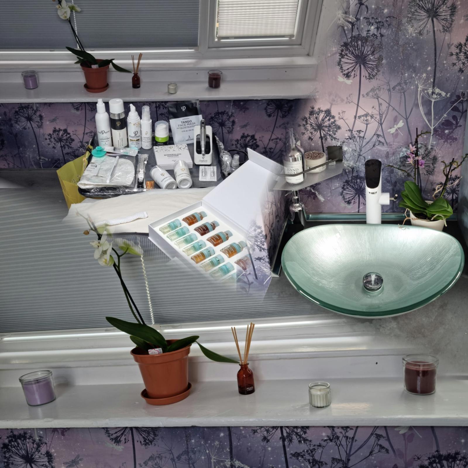 Adriana offering a personalised beauty consultation in a calm and intentional space at Infinity Beauty
